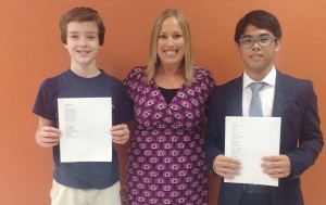 Jonathan Harvey, at left, and Eric Lee, at right, were recognized in Huntsville Literary Association's Young Writers Contest. Harvey and Lee are in Ambra Johnson's creative writing class at Liberty Middle School. (CONTRIBUTED) 