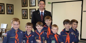 Cub Scouts in Den 14 were all smiles during their visit with Mayor Troy Trulock at Madison City Hall. The group includes Ben Bagwell, from left, Eli Alexander, Connor Murphree, Will Votroubek, Trulock, Jonathan Irvin, John Rinne and Alex Lively. (CONTRIBUTED) 