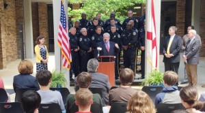 Special Resource Officers with Huntsville Police Department, in background, were recognized recently in a ceremony with Huntsville Mayor Tommy Battle, Police Chief Lewis Morris and superintendent Dr. Casey Wardynski. (CONTRIBUTED) 