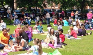 Enjoying the beautiful spring weather, families at Madison Elementary School gathered on the school lawn for "Summer Reading is a Picnic." (CONTRIBUTED) 