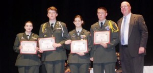 Principal Dr. Brian Clayton, at right, congratulates each grade's top academic cadets in James Clemens High School JROTC at their Awards Night. Top cadets are freshman Jessica Whigham, from left, sophomore Matthew Myers, junior Lauren Brashear and senior Frank Herring. (CONTRIBUTED) 