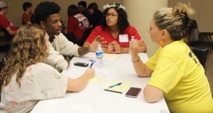 Teenagers in Today's Youth, Tomorrow's Leaders (TYTL) program discuss plans for their second annual town forum about drug trends, which will be held on July 23 at the downtown Huntsville-Madison County Public Library. (CONTRIBUTED) 