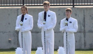 Wenle Mu, from left, Matt Day and Josh Todd are calling signals as drum majors for the 2015 Bob Jones High School Band. (Photo by Pete Shea) 