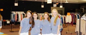 Clothing for Confidence founder Madison Rolling, from left, Nicole McDuffie, Morgan Brazelle and Amy Carden prepare for shoppers at Clothing for Confidence, held at Inside-Out Ministries. (CONTRIBUTED) 
