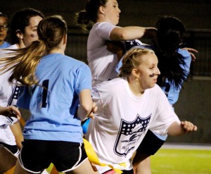 Claire Miville, a James Clemens junior, sheds a block while going after a freshman player. (RECORD PHOTO/LEXIE TUBELL)