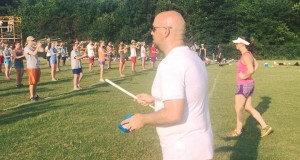 Kevin Smart, assistant band director at Bob Jones High School, supervises a drill rehearsal during band camp this summer. (CONTRIBUTED) 