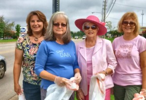 Members of the Huntsville Chapter of Daughters of the American Revolution (DAR) who removed trash along Hughes Road on Sept. 1 are Beth Agee, from left, Regent Wilma Stone, Chris Cowley and Regina Lyon. Not pictured is Betty Vaughan. (CONTRIBUTED) 