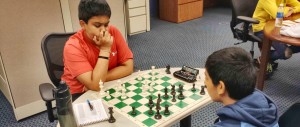 Mohak Agarwalla, at left, upsets favored Om Badhe in the final round of October's Sunny Street Cafe Grand Prix Tournament. (CONTRIBUTED) 