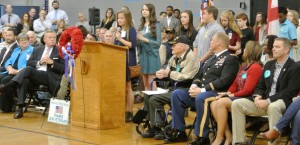 Students read poems and narratives for veterans at the "DMS Tribute to Heroes" at Discovery Middle School. (CONTRIBUTED) 