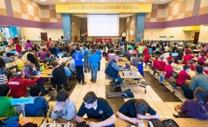 Parents and 172 chess contestants packed Mill Creek Elementary School's cafeteria between rounds at the Queen's Quest Chess Tournament. CONTRIBUTED