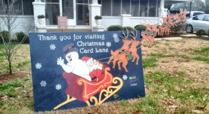 Sandy Sparks painted "Frosty The Snowman and Santa" for Christmas Card Lane. CONTRIBUTED