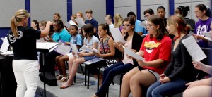 Chorus students from Bob Jones high and Discovery middle schools will be in concert on Dec. 16. In this photo, chorus teacher Marla Jenkins conducts at a summer camp. CONTRIBUTED