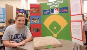 Sixth-grader Mitchell Dashoff designed a high-tech 'home plate' for Innovation Day at Madison Elementary School. RECORD PHOTOS/GREGG L. PARKER