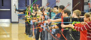 Mill Creek students stand in position to shoot their arrows. Mill Creek Elementary School will host an archery tournament on Jan. 11-12. CONTRIBUTED/JFD PHOTOGRAPHY & DESIGN