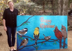 For her Christmas Card Lane painting, Heather Baumbach created a tribute to birds in her backyard. CONTRIBUTED