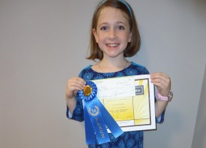 Caroline Kokan was excited to win first place in the essay contest sponsored by Madison Station Historical Preservation Society. Caroline is a third-grader at Horizon Elementary School. RECORD PHOTOS/GREGG L. PARKER 