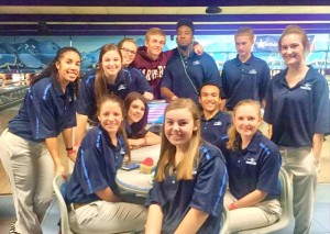 James Clemens bowlers take a break during the state championships at Oak Mountain Lanes in Pelham. From left on the back row are Daniela Connor, Ashley Jordan, Shaley Smith, Brian Rowe, Travis Ware, Bentley Stirling and Madisyn Bedingfield. In the middle are Bailey Nation, Madalyn McGuire, Luca Connor and Haley Branson and out front is Kyndal Oden. CONTRIBUTED