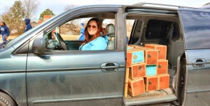 Mindy Slinkard, a parent in Girl Scout Troop 1922, loaded her van with Tagalongs and Toffee-tastic gluten-free cookies on delivery day in Madison on Feb. 6.  CONTRIBUTED