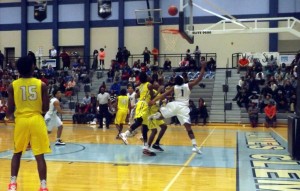 Jets Senior Marquise Mitchell (1) goes up for a shot against Johnson at Senior Night. RECORD PHOTOS/CHARLEY GAINES