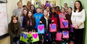 Students at Mill Creek Elementary School delivered 60 Valentine's Day treat bags at Huntsville Hospital. CONTRIBUTED