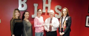 Bob Jones PTSA members Carolyn Tolbert, from left, Alisa Henrie and president Amanda Kay accept a check from Scott Piro, president of Optimist Club of Madison. Principal Sylvia Lambert also witnessed the donation. CONTRIBUTED
