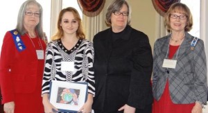 Madison Academy junior Nadiya Smyrnova, second from left, won the American Citizen award from DAR. Congratulating Smyrnova are Wilma Stone, from left, art teacher Peggy Hickerson and Linda Baccus. CONTRIBUTED