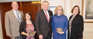 Carol Bohatch, second from left, and Nancy Brandon, second from right, are nominees for State Teacher of the Year. They receive congratulations from Dr. Brian Clayton, from left, Dr. Dee Fowler and Dorinda White. CONTRIBUTED