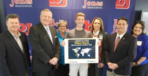 Ethan Smyth of Bob Jones High School accepts congratulations for his Nat Geo Mundo Explorer award from Madison County Commissioner Steve Haraway, from left, Madison City Schools Superintendent Dr. Dee Fowler, Madison Board of Education member Connie Spears, Bob Jones Principal Sylvia Lambert, Mayor Troy Trulock and Mo Brooks staffer Tiffany Noel. CONTRIBUTED