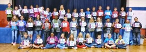 Children in military families were special honorees during an assembly at West Madison Elementary School. Each military child received a certificate and super-hero dog tag.  CONTRIBUTED