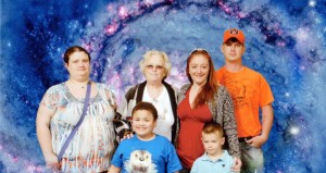 Paula Thrailkill, standing second from left, enjoys an outing with her family at the U.S. Space & Rocket Center. CONTRIBUTED