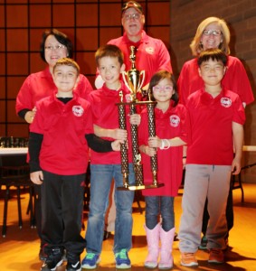 Rainbow Red team won first place in the primary division at the 2016 State Scholastic Chess Championship. Members are Karsten Wallace, front from left, Zachary Calinsky, Caroline Wang, Geon Park and coaches Ranae Bartlett, back from left, Bill Nash and Nancy Brandon. CONTRIBUTED