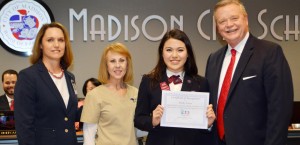 Mindy Foster accepts her recognition certificate from Bob Jones High School Principal Sylvia Lambert, from left, HOSA sponsor Melinda Lawson and superintendent Dr. Dee Fowler. CONTRIBUTED