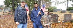 Madison American Legion, Post 229 will place flags on veterans' graves for Memorial Day. Post 229 Legionnaires Michael Marcel, from left, Earl Watts, along with Cody Marcel, placed flags in 2015. CONTRIBUTED