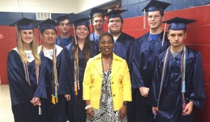 Before graduation, seniors from Bob Jones High School visited their alma mater, West Madison Elementary School. West Madison Principal Dr. Daphne Jah, center, welcomed the seniors back 'home.' CONTRIBUTED