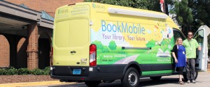 Outreach Department librarian Mandy Pinyan and courier George Channell prepare to board the BookMobile, a service of Huntsville-Madison County Public Library. CONTRIBUTED