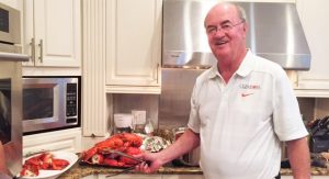 Lieutenant Colonel John Logan prepares a lobster feast for a family gathering. CONTRIBUTED
