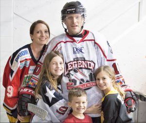 The Detulleo family wears hockey gear to support dad Glenn Detulleo, Head Coach of Huntsville Havoc. Family members are Jen, clockwise from top, Glenn, Berlin, Benham and Ebba. CONTRIBUTED/JFD Photography & Design 