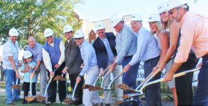 Participants at Madison Bible Church's groundbreaking for a new building were Dan Morgan, from left, Bill Kreis and grandson Charley, Jerry Fountain, Mayor Troy Trulock, Mark Burcham, Pastor Jay Hughes, Pastor Bill Young, Brian Tucker, Sara Elledge, Cameron Hughes and Bill Martin. CONTRIBUTED