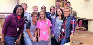 In October, Signalink employees collected canned foods and served lunch at the Downtown Rescue Mission. CONTRIBUTED
